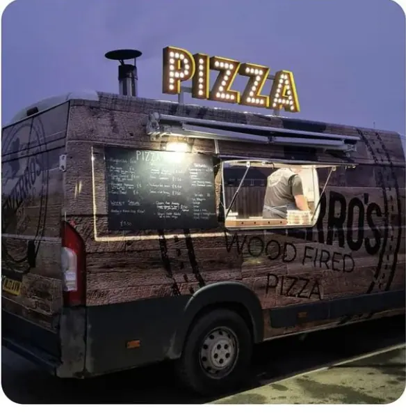 Pizza van with illuminated PIZZA letters
